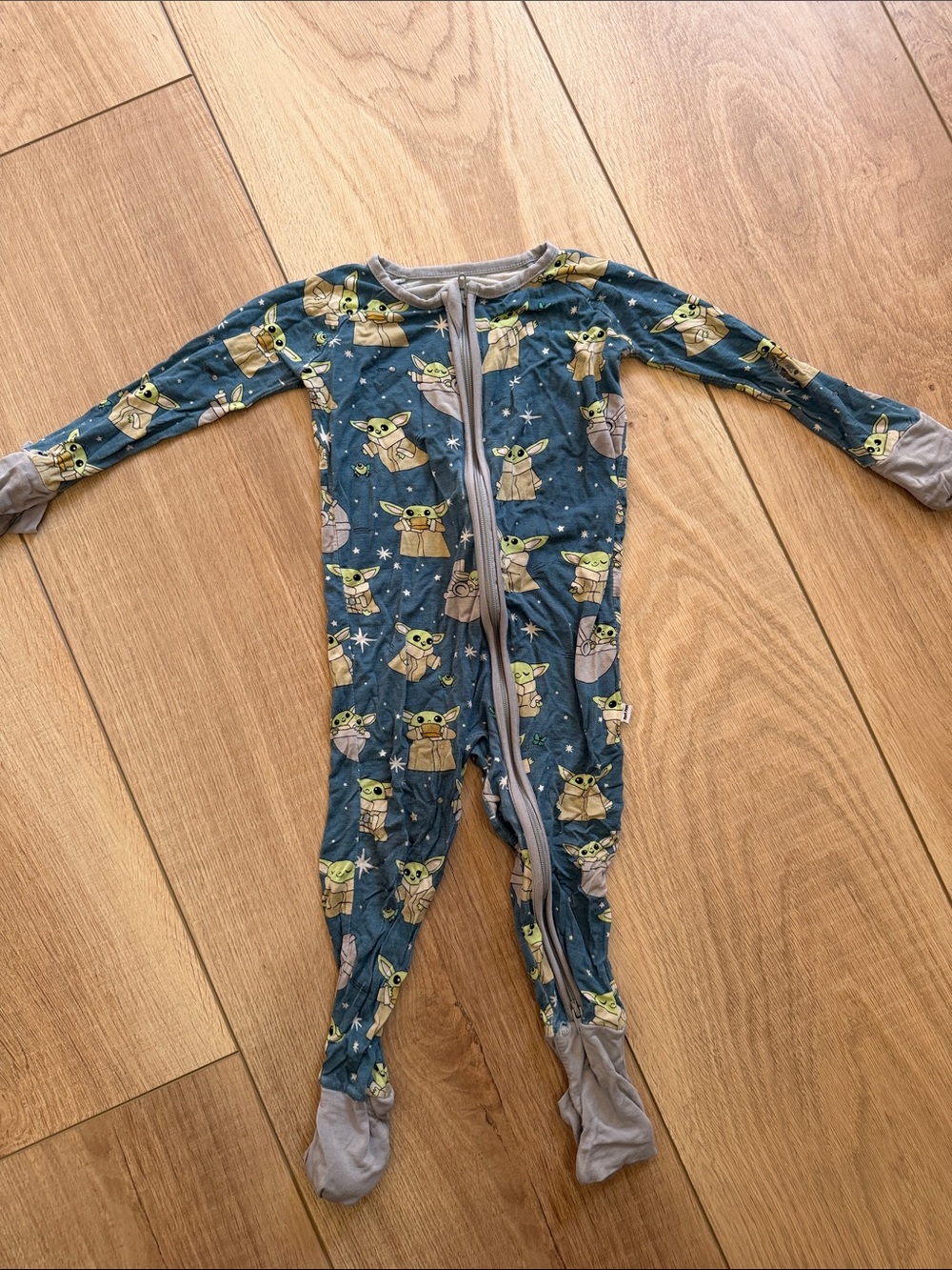 Little Sleepies Teal Footed One-Piece with Green Character Print
